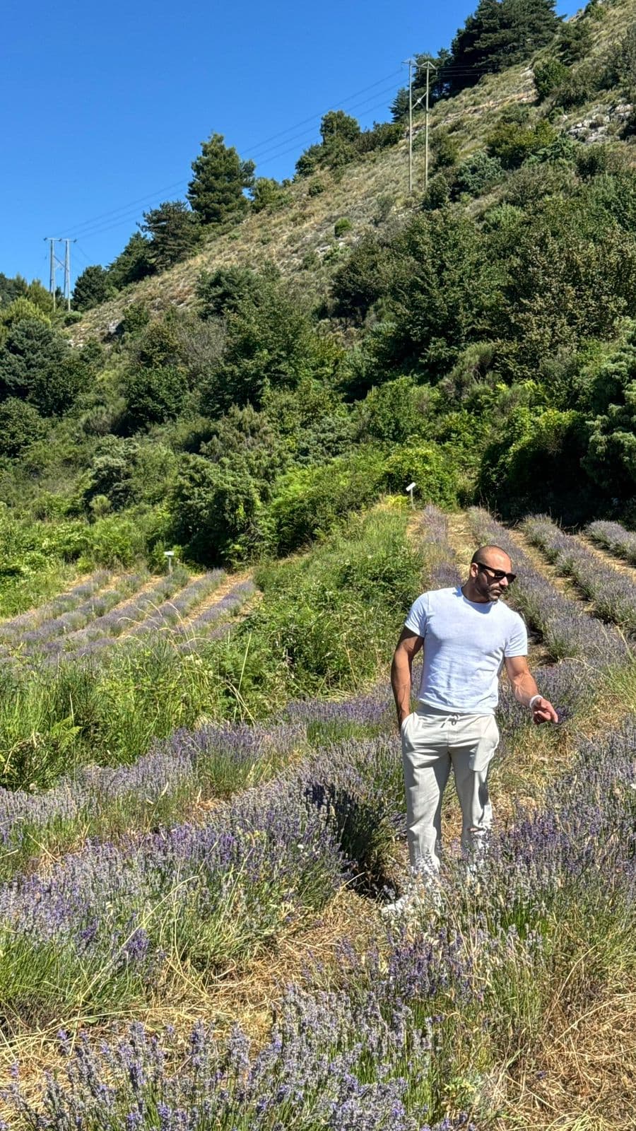 Ahmed Al Hassoni in a wild lavender field at CERGA Observatory on the Calern plateau in Caussols, South of France