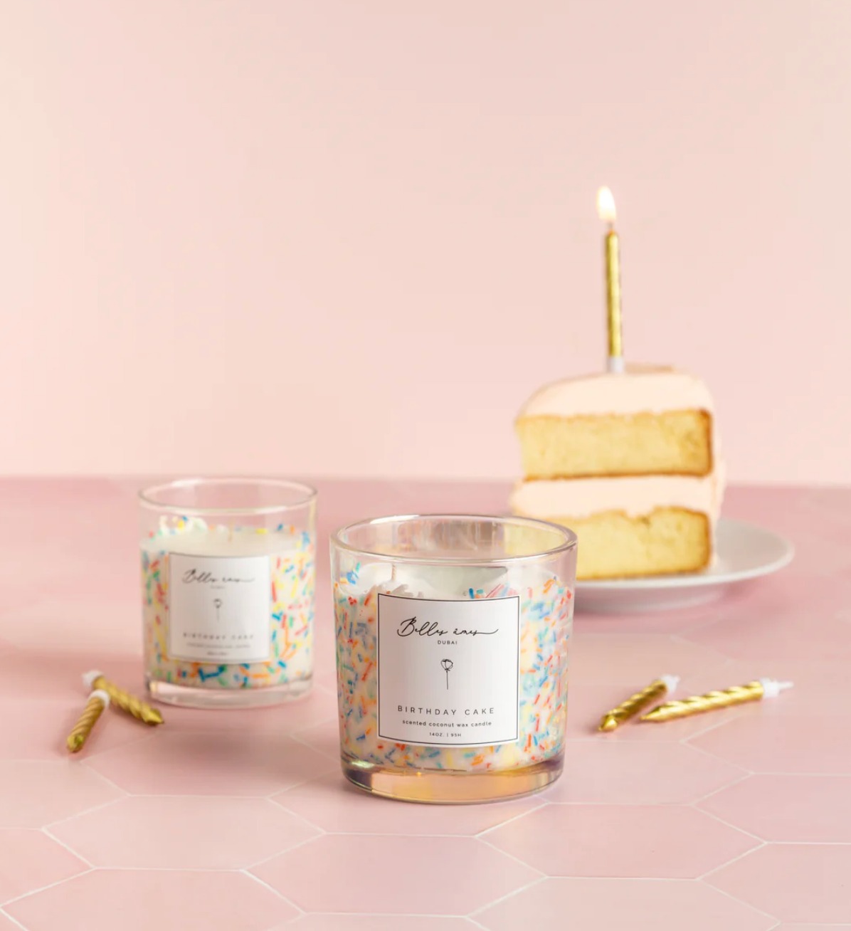 Belles Âmes candle collection displayed with branded setup